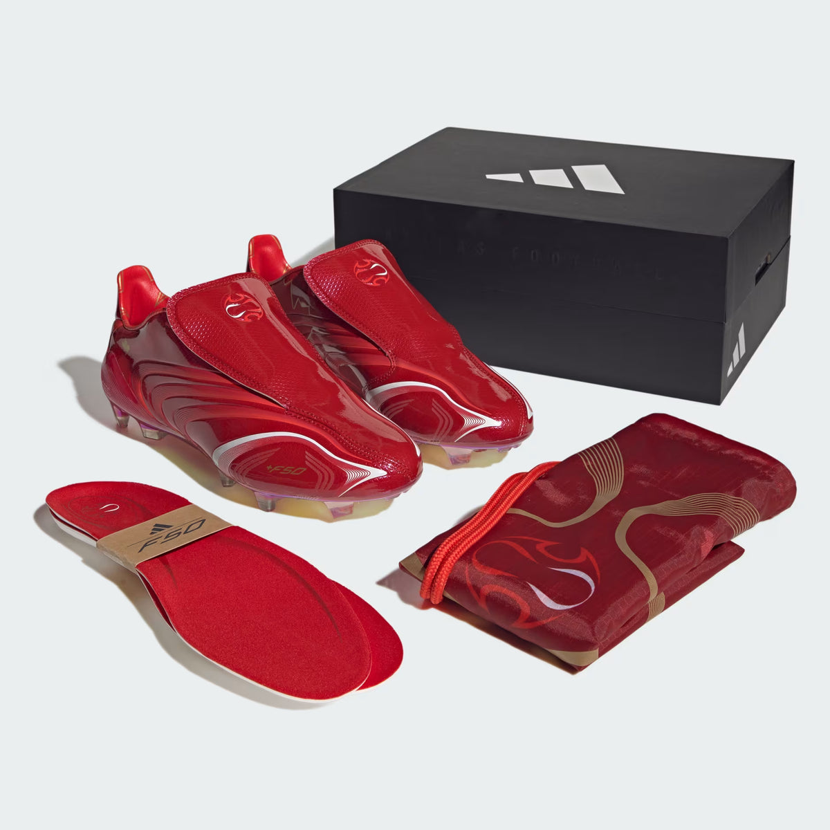 F50 Tunit Firm Ground Football Boots
