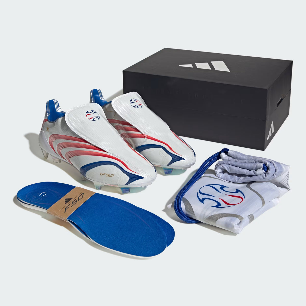 F50 Tunit Firm Ground Football Boots