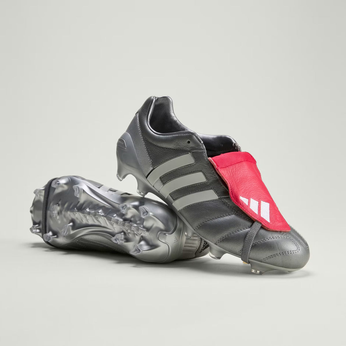 PREDATOR MANIA Firm Ground Football Boots