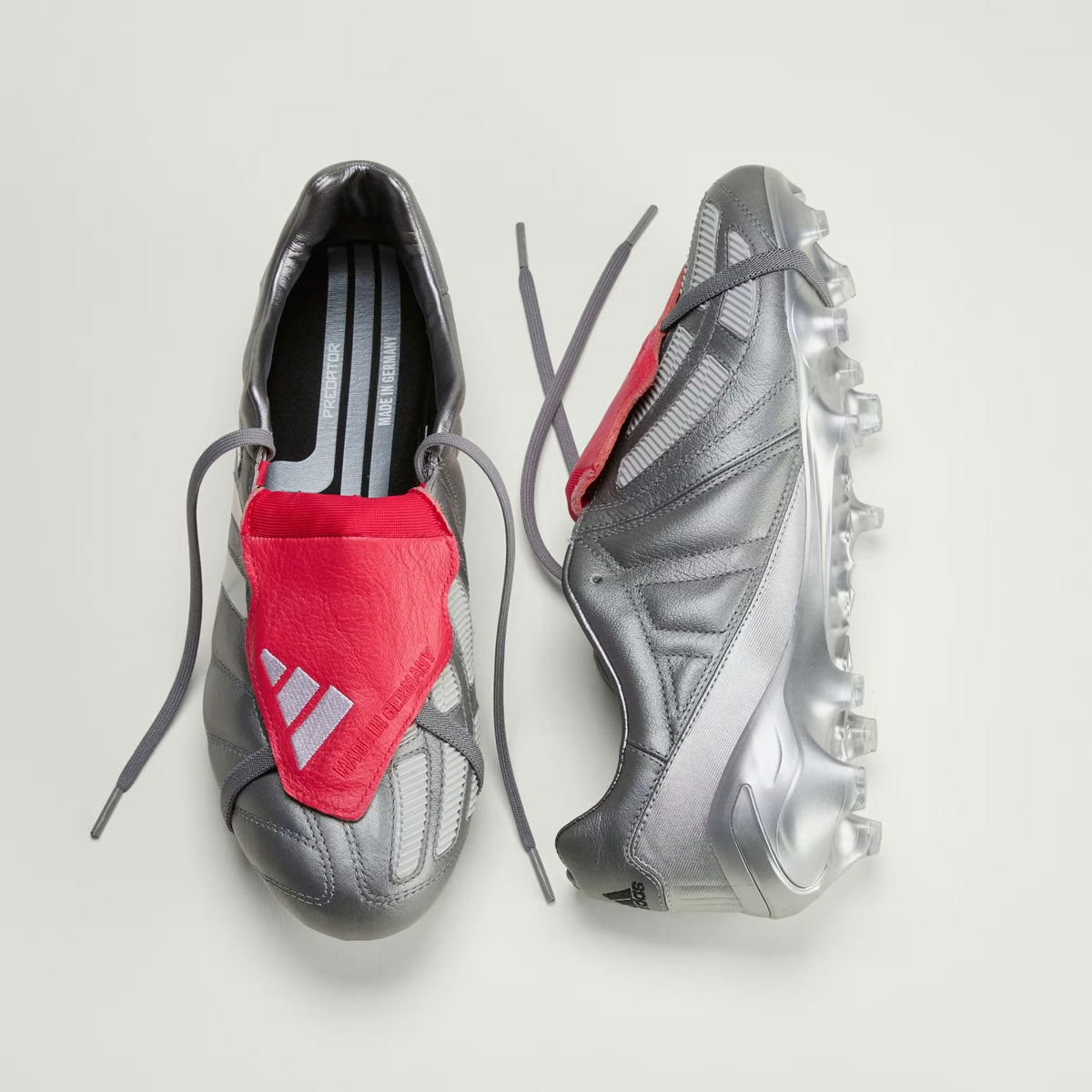 PREDATOR MANIA Firm Ground Football Boots