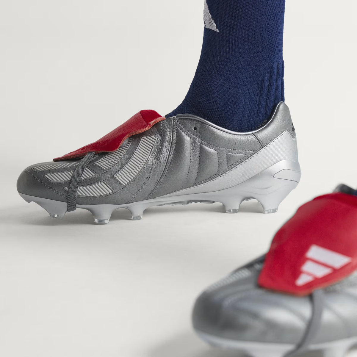 PREDATOR MANIA Firm Ground Football Boots