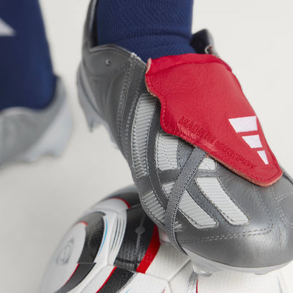 PREDATOR MANIA Firm Ground Football Boots
